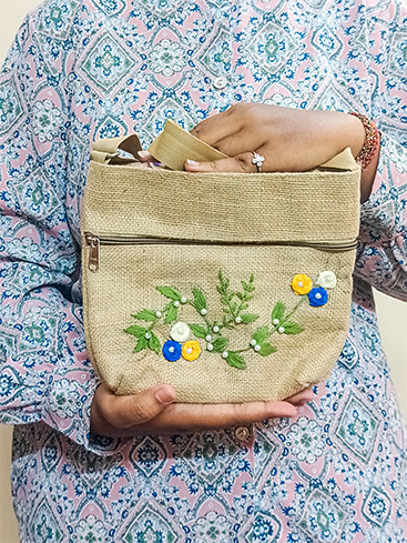 JUTE SLING BAG , HAND EMBROIDERY , UNIQUE DESIGN . ECO-FRIENDLY